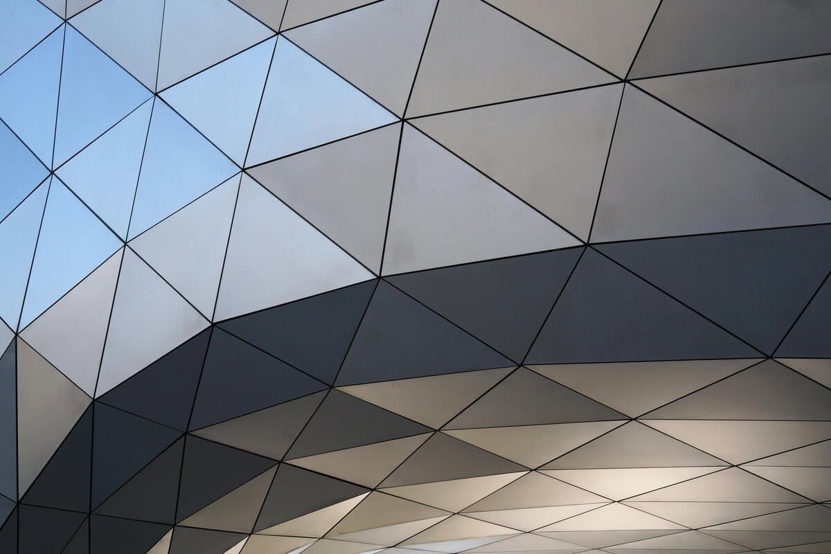 Geometric architectural pattern representing the structured framework behind the Organizational Systems Method.